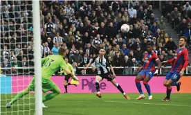  ?? Lee/Shuttersto­ck ?? Miguel Almirón scores the winning goal for Newcastle in the first half. Photograph: Richard