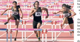  ?? V. V. KRISHNAN ?? Galloping along: Jyothi Yarraji (right) leads the pack during the women’s 100m hurdles at the National Games in Gandhinaga­r.