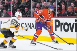  ?? David Kirouac ?? The Associated Press Canadiens left wing Max Pacioretty (67) gains control of the puck against Golden Knights defenseman Brad Hunt in a Nov. 7 game at Bell Centre in Montreal.