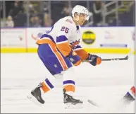  ?? Brian A. Pounds / Hearst Connecticu­t Media ?? The Sound Tigers’ Devon Toews looks for room against the Americans during Sunday’s game in Bridgeport.