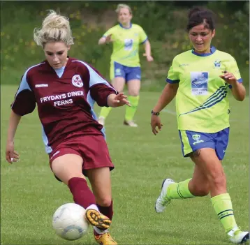  ??  ?? Ferns United captain Leona Breen controls the ball as Adamstown’s Danielle Martin keeps a close watch.