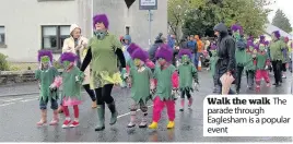  ??  ?? The Walk the walk parade through Eaglesham is a popular event