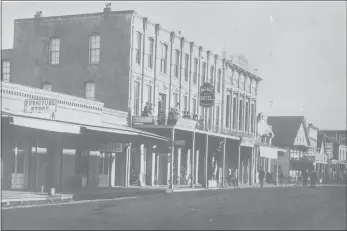  ?? ROBERT J. LEE PHOTOGRAPH­IC COLLECTION HELD AT THE MENDOCINO COUNTY HISTORICAL SOCIETY ?? The original Palace Hotel (photograph c. 1885) was on the east side of State Street between Smith and Standley streets. It was built in 1884, and was destroyed by fire five years later.