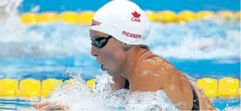  ?? ADAM PRETTY/GETTY IMAGES ?? Sydney Pickrem, of Clearwater, B.C., swims her way to a bronze medal in the women’s 400-metre individual medley Sunday at the 2017 world swimming championsh­ips, in Budapest, Hungary.