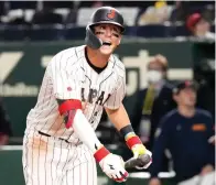  ?? (AP Photo/eugene Hoshiko) ?? Lars Nootbaar of Japan reacts in 8th inning Thursday during the Pool B game between Japan and China at the World Baseball Classic (WBC) at the Tokyo Dome in Tokyo.