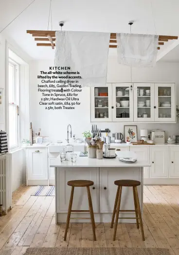  ??  ?? KITCHEN The all-white scheme is lifted by the wood accents. Chalford ceiling dryer in beech, £85, Garden Trading. Flooring treated with Colour Tone in Spruce, £82 for 2.5ltr; Hardwax Oil Ultra Clear soft satin, £84.50 for 2.5ltr, both Treatex