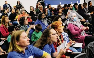  ?? Sam Owens/Staff photograph­er ?? A crowd listens to public comments in November before the SAISD board approved a rightsizin­g plan that will close a number of schools. Thousands of families will need to choose new schools.