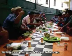  ??  ?? BERBUKA puasa dengan penduduk setempat di Labuan Bajo.