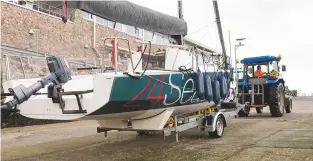  ??  ?? Launching the Seascape 24 from her trailer at Queen Anne’s Battery