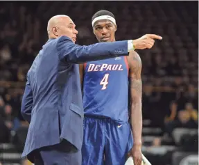  ?? JEFFREY BECKER/USA TODAY SPORTS ?? Coach Dave Leitao, talking with forward Paul Reed, has guided DePaul to 8-0, the best start in school history in three decades.