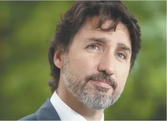  ?? - La Presse canadienne: Adrian Wyld ?? Le premier ministre Justin Trudeau