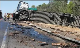  ?? Rick McClure/For The Signal ?? A big rig crashed and overturned while traveling northbound on Interstate 5 near McBean Parkway Monday afternoon.
