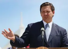  ??  ?? DeSantis speaks to the media about the cruise industry during a press conference at Port Miami in Miami, Florida.