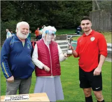  ??  ?? Oisin Keogh gets his MOTM trophy from Sydney Byrne O’Reilly.