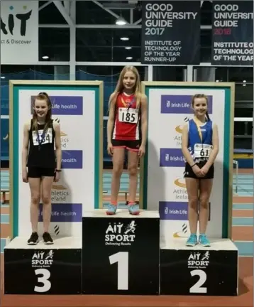  ??  ?? Silkena of Dundalk St Gerard’s AC (centre), who won the U13 girls 60m hurdles and long jump and finished second in the shot putt at the Leinster indoor championsh­ips in Athlone.