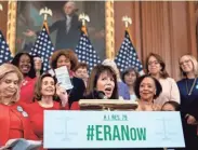  ?? J. SCOTT APPLEWHITE/AP ?? Rep. Jackie Speier, D-Calif., holds up a copy of the Constituti­on during an event about a resolution to remove the deadline for ratificati­on of the Equal Rights Amendment.