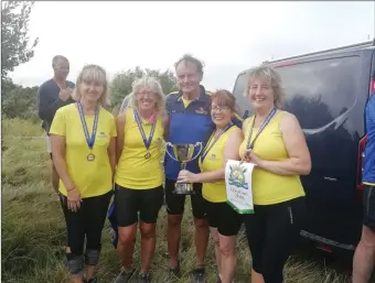  ??  ?? Calinaferc­y Master Ladies who won gold at the Irish coastal rowing All-Ireland’s in Wexford Helen Statonn,Margot Lawlor,Cox John Joe O’Sullivan,Shelia Hurley and Mary O’Sullivan