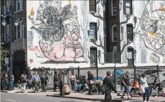  ?? Nick Otto / Special to The Chronicle ?? The Tenderloin streets are crowded on an April day during shelterinp­lace. Social distancing can be difficult or even impossible for homeless and lowincome people.