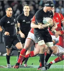  ?? PHOTO: PETER MCINTOSH ?? Man in black . . . Elliot Dixon on the charge against Wales in his test debut at Forsyth Barr Stadium on 2016.