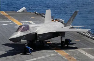  ??  ?? File photo shows a Lockheed Martin F-35B stealth fighter is seen on the USS Wasp (LHD 1) amphibious assault carrier during their operation in the waters off Japan’s southernmo­st island of Okinawa. — Reuters photo