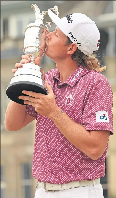  ?? ?? Open champion Cameron Smith kisses the Claret Jug at the Old Course last month