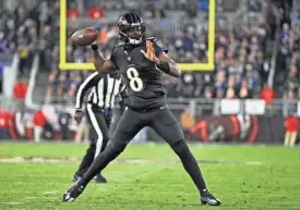  ?? TERRANCE WILLIAMS/AP ?? Ravens quarterbac­k Lamar Jackson throws a pass during the first half against the Bengals on Nov. 16 in Baltimore.