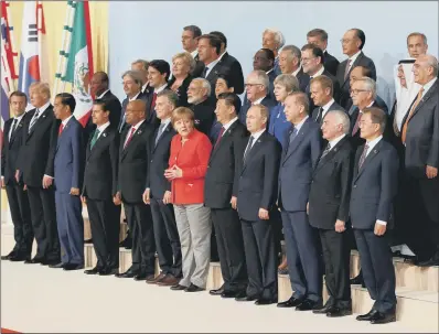  ?? PICTURE: PA WIRE. ?? MEETING OF MINDS: World leaders pose for a group photograph during the G20 summit in Hamburg.