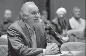  ?? TIM COOK/THE DAY ?? In this 2014 file photo, Manuel J. Rivera smiles as he remarks about moving home to New London after the New London Board of Education voted unanimousl­y for Rivera’s officially appointmen­t as the new superinten­dent of New London Public Schools.