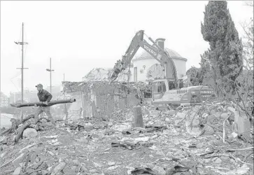  ?? Photograph­s by Denis Sinyakov For The Times ?? A SHOPPING MALL in Yalta, Crimea, is among the businesses being razed. Since the annexation by Russia, pro-Moscow leaders in Crimea have seized thousands of businesses, some of which have been privatized.