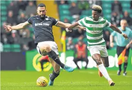  ??  ?? McCann praised Steven Caulker’s display in the Dundee defence.