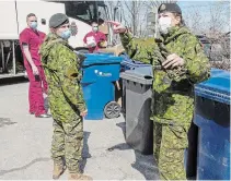  ?? RYAN REMIORZ THE CANADIAN PRESS FILE PHOTO ?? Canadian Armed Forces personnel arrive at the Villa Val des Arbes seniors residence in Laval, Que., in April.