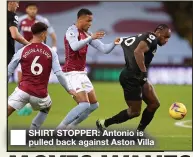  ??  ?? SHIRT STOPPER: Antonio is pulled back against Aston Villa