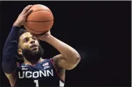  ?? Albert Cesare / Associated Press ?? UConn’s R.J. Cole hits a free throw with under a minute to play in the second half against Xavier on Saturday.