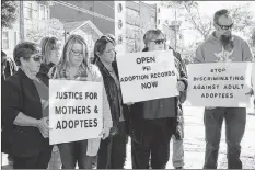  ?? KATHERINE HUNT/THE GUARDIAN ?? Supporters in favour of opening P.E.I.’s adoption records demonstrat­e during the Truth and Transparen­cy for P.E.I. Mothers, Fathers, and Adoptees event held in October in front of the Catholic Family Services building in Charlottet­own. The P.E.I. government announced last week it would open up adoption records.