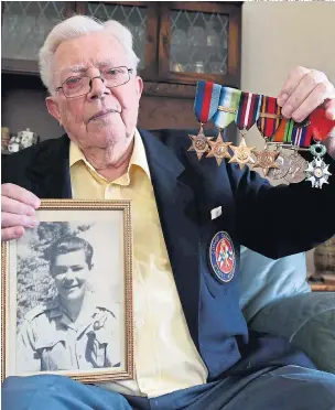 ?? Picture: anDrew teeBay ?? Denis Rose with his wartime medal collection and a photo of brother Peter