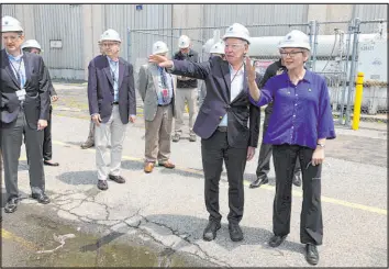  ?? Jennifer Mcdermott The Associated Press ?? U.S. Energy Secretary Jennifer Granholm, right, and U.S. Rep. Joe Courtney tour the Millstone Nuclear Power Station in Waterford, Conn., on Friday.