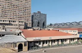  ?? | SHELLEY KJONSTAD ?? THE DURBAN Ice Arena from the Colony, showing the developmen­t in the vacant lot in front. There is a small mosque among the buildings. African News Agency (ANA)