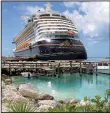  ?? Orlando Sentinel/TNS/JOE BURBANK ?? The Fantasy stands docked at Disney’s Castaway Cay in the Bahamas. Disney’s fleet of four cruise ships will soon expand.