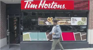  ?? THE CANADIAN PRESS ?? Tim Hortons called the franchisee­s’ proposed class action Friday “another unfounded lawsuit.”