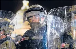  ?? KENNY HOLSTON/THE NEW YORK TIMES ?? New details about what authoritie­s anticipate­d Jan. 6 highlight failures to grasp the degree of the threat from pro-Trump right-wing extremists. Above, a National Guard member seen the day of the U.S. Capitol riot in Washington.