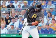  ?? AP-Gene J. Puskar, File ?? Pittsburgh Pirates’ Josh Bell hits a three-run home run off Chicago Cubs starting pitcher Adbert Alzolay during the first inning of a baseball game in Pittsburgh. Christian Yelich and Bell are among eight competitor­s in this year’s All-Star Game Home Run Derby, which is handing out a $1 million prize to the winner.