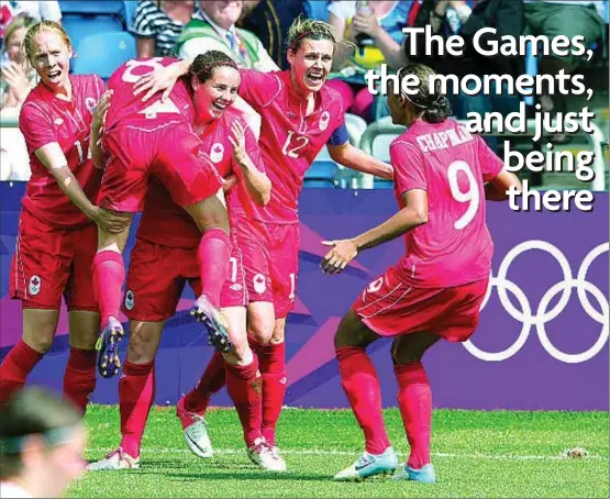  ?? FRANK GUNN, THE CANADIAN PRESS ?? Canada forward Christine Sinclair (12), defender Rhian Wilkinson (7) and midfielder Brittany Timko (left) and defender Candace Chapman (9) hoist midfielder Diana Matheson into the air after she scored the game winning goal against France in the bronze medal soccer game in 2012.