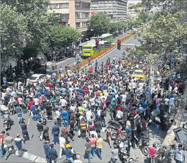 ?? [ AFP ] ?? Die Polizei versuchte Demonstrat­ionen in Teheran schnell aufzulösen.