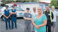  ??  ?? Members of the Mt Roskill Community Patrol led by Merril Bourne along with Mt Roskill Community Policing Team Sergeant Nick Poore and Avondale Senior Sergeant Simon Welsh.