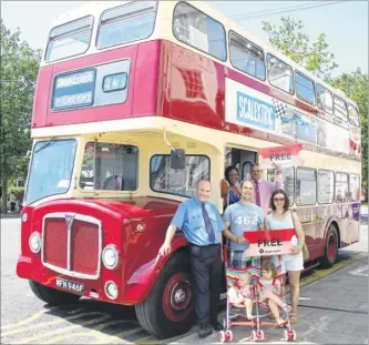  ??  ?? Miles and Louise Porter with daughters Dilys and Bonnie, from Tenterden, help launch the free bus service with, left to right, bus driver Paul Houselande­r, Stagecoach marketing manager Divene Anderson and Dutch Docherty, operations manager