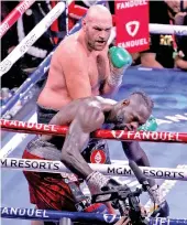  ?? ?? Tyson Fury delivers the decisive blow to Deontay Wilder in the 11th round