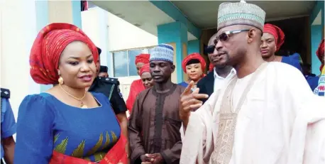  ?? Photo: Abubakar Sadiq Isah ?? Chairman of Abaji Area Council, Alhaji Abdulrahma­n Ajiya with wife of the FCT Commission­er of Police and chairperso­n of Police Officers Wives Associatio­n, Mrs Margret Kimo, when she led the associatio­n on a courtesy call to the chairman in his office...