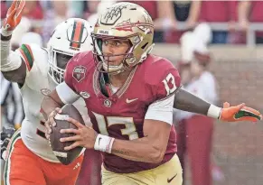  ?? MELINA MYERS/USA TODAY SPORTS ?? Florida State quarterbac­k Jordan Travis scrambles against Miami on Nov. 11.