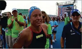  ??  ?? Double vainqueur des Mondiaux en eau libre sur 10 km, elle rêve des JO.