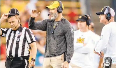  ?? COURTESY PHOTO/KYLE HESS ?? Navy defensive coordinato­r Brian Newberry, who served as defensive coordinato­r at Kennesaw State the last four years, has always believed in having an aggressive and attacking mindset.